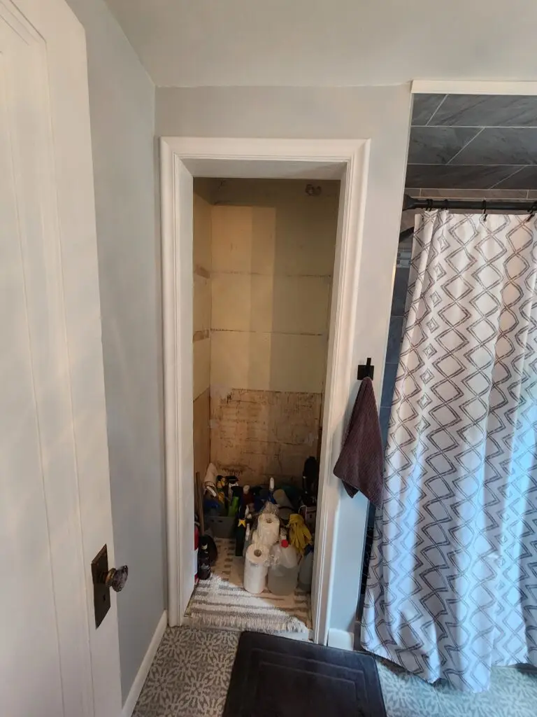 Bathroom Linen Closet Renovation in Wyandotte — adjustable shelving installation